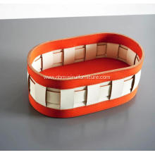 White and orange saddle leather storage baskets